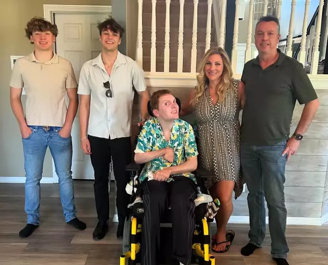 A picture of the owner of Speedy Dumpster Rental and his family.